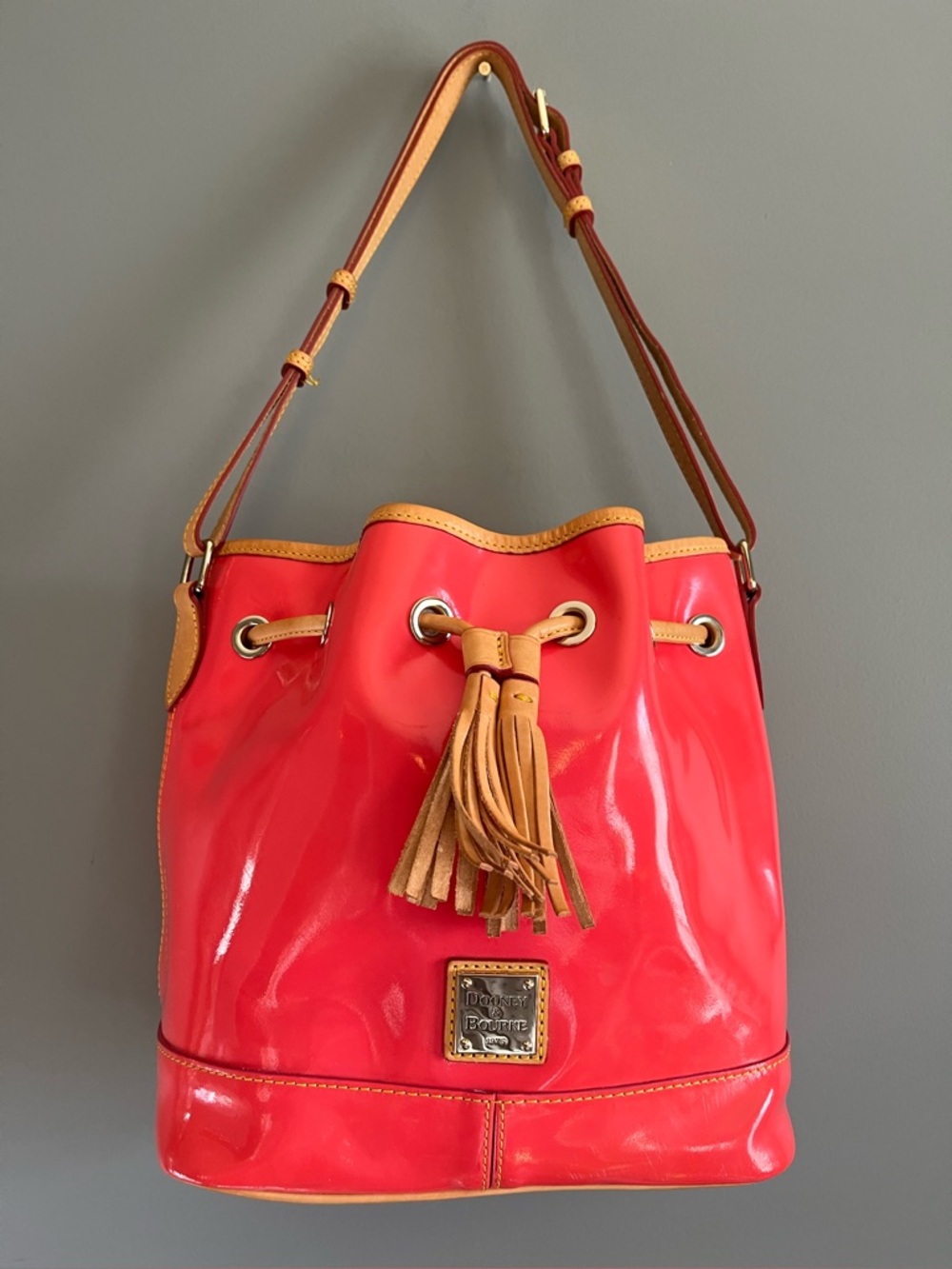 Dooney & Bourke Pink/Coral Patent Leather Drawstring Bucket Bag-Tan Leather Trim